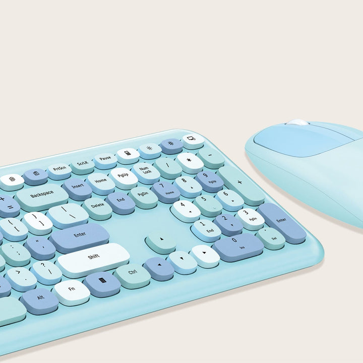 Close-up of SaharaCase KB3 aqua rounded keys and matching mouse