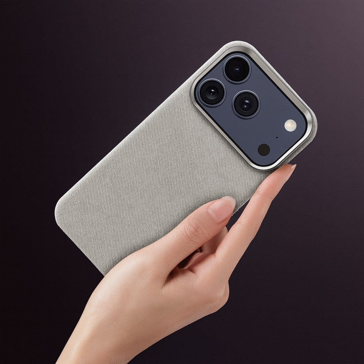 SaharaCase Indy Suede Leather Case for iPhone 17 Pro Max — gray case held in hand