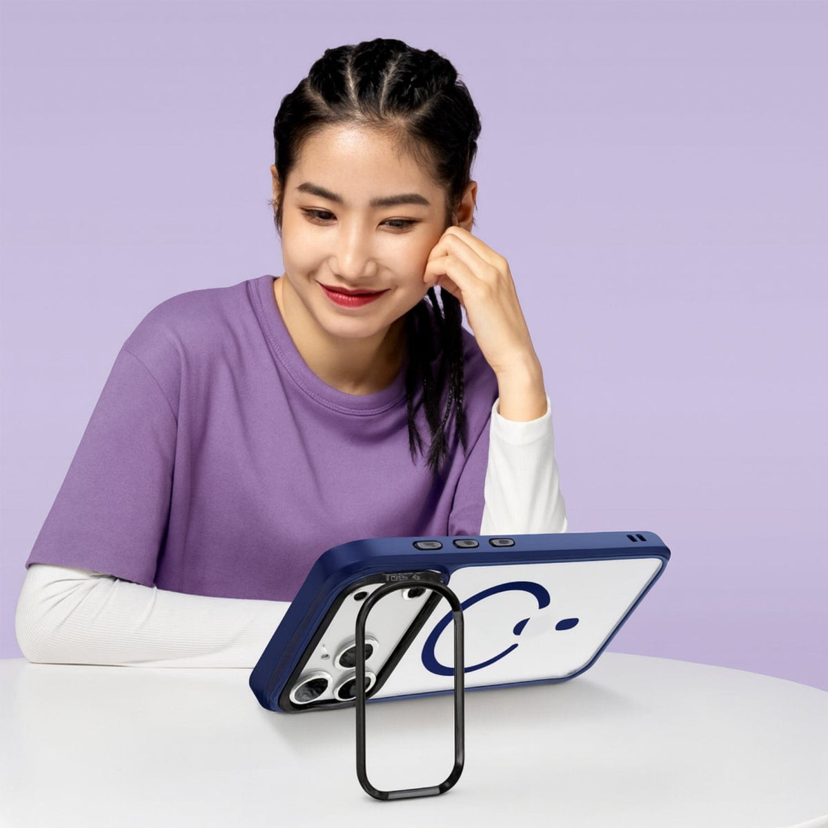 SaharaCase Raider Clear Back Case for iPhone 17 Pro — blue stand in use