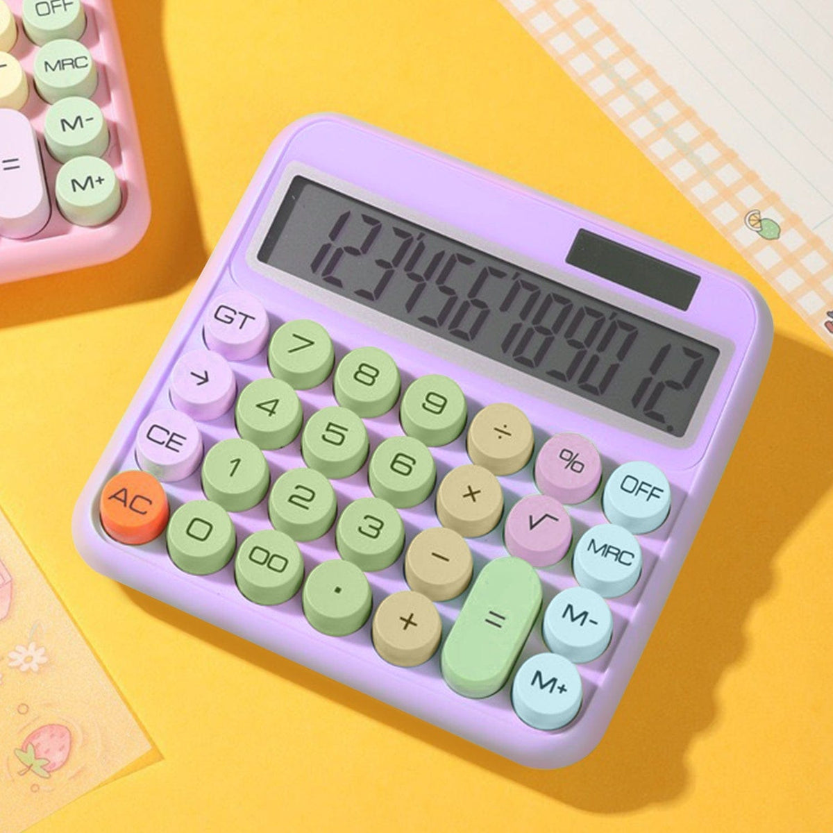SaharaCase Purple KB51 calculator on a yellow desk background