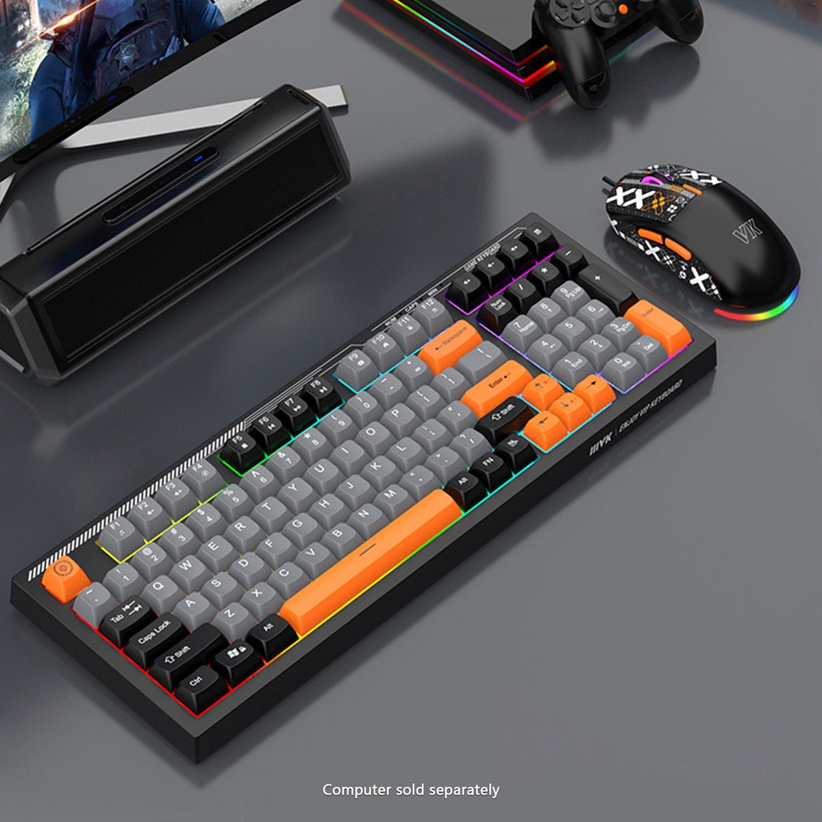 KB29 orange-accent keyboard and illuminated mouse on a gaming desk