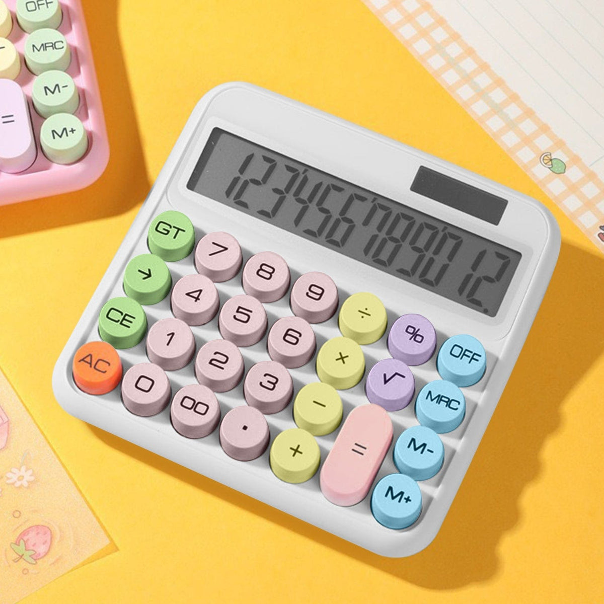 SaharaCase Cream KB53 calculator on a yellow desk background