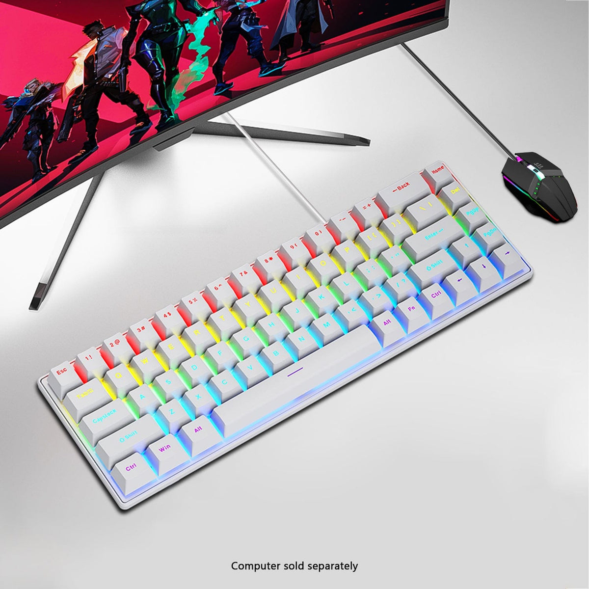 KB33 white keyboard and mouse below a gaming monitor