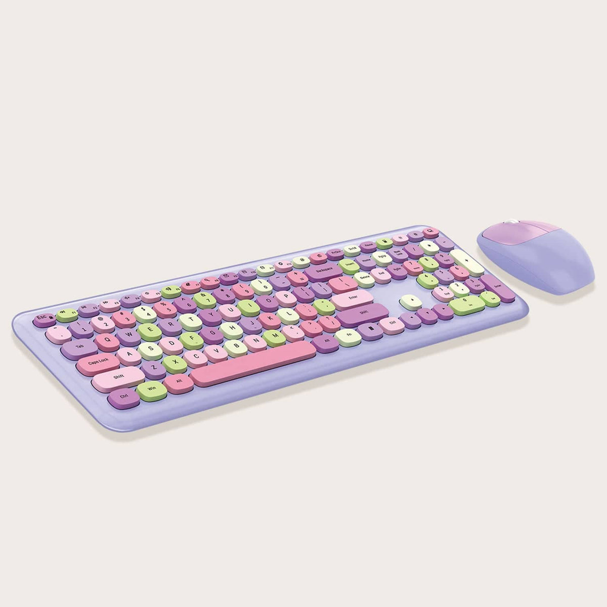 Angled view of the purple KB5 full-size keyboard and mouse