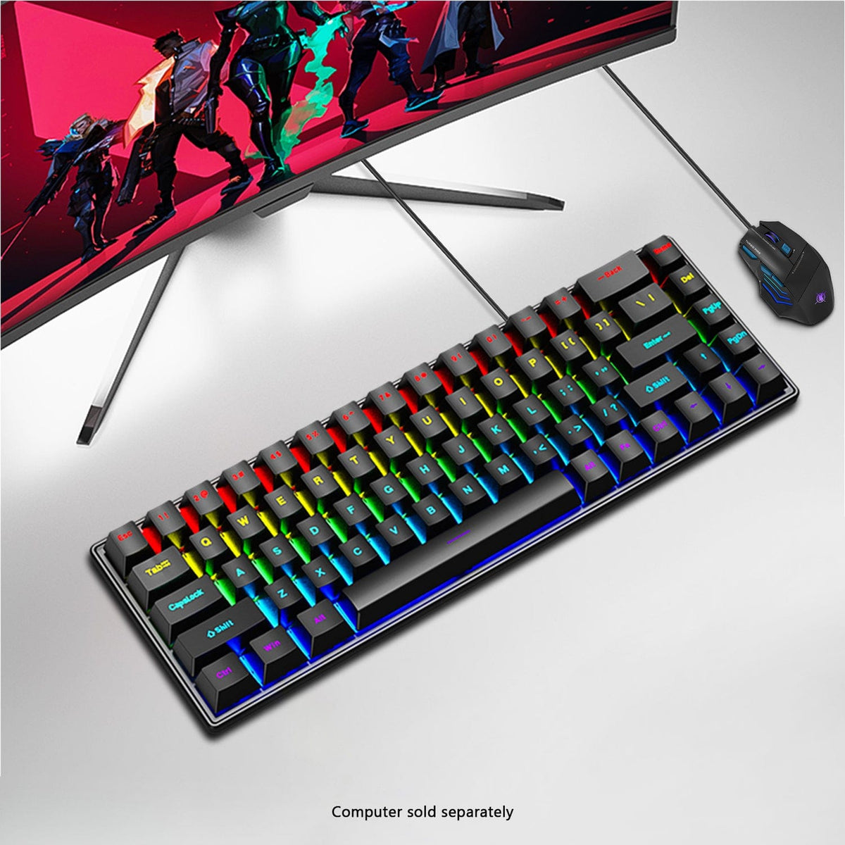 KB35 compact keyboard and mouse below a gaming monitor