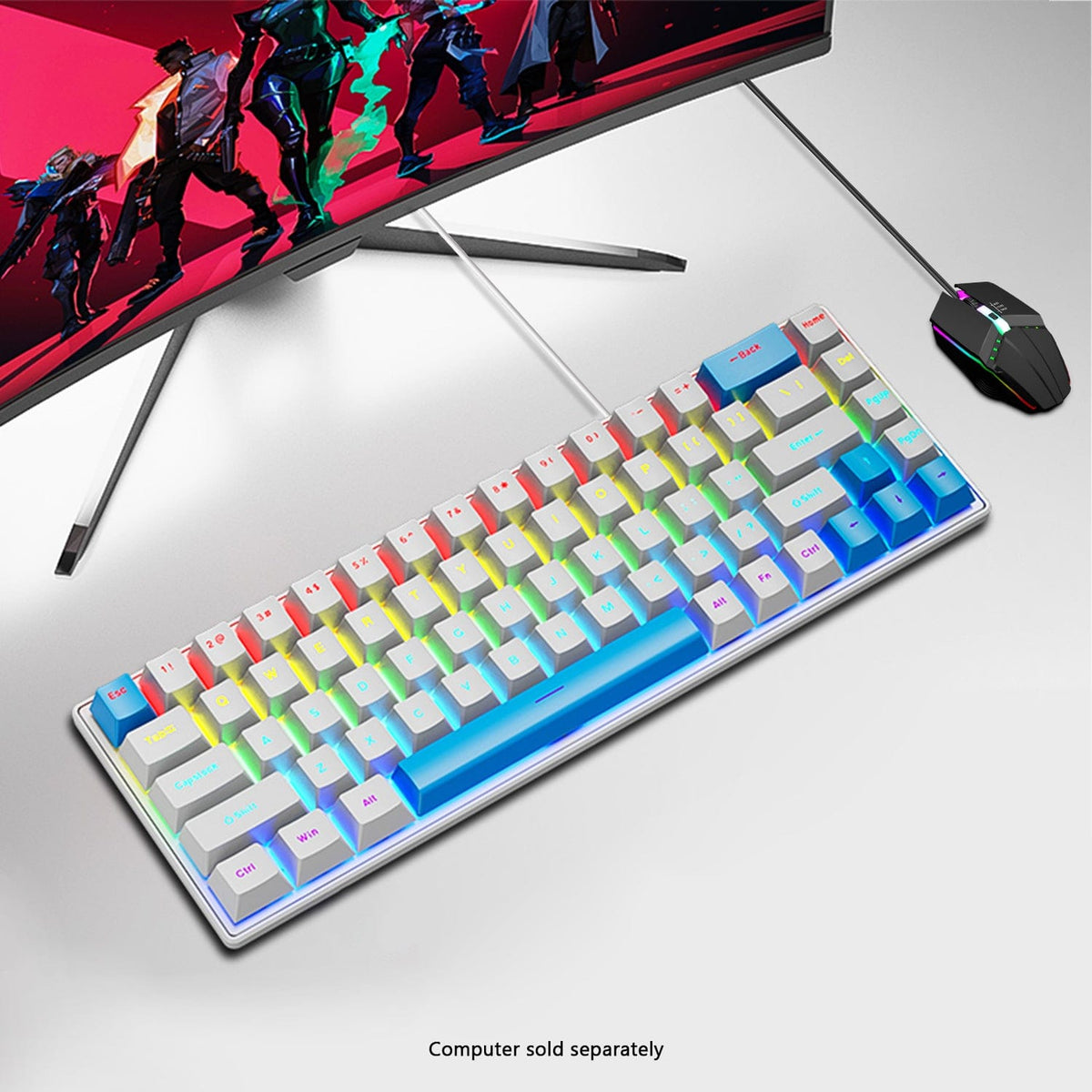 KB34 keyboard and mouse below a monitor on a white desk