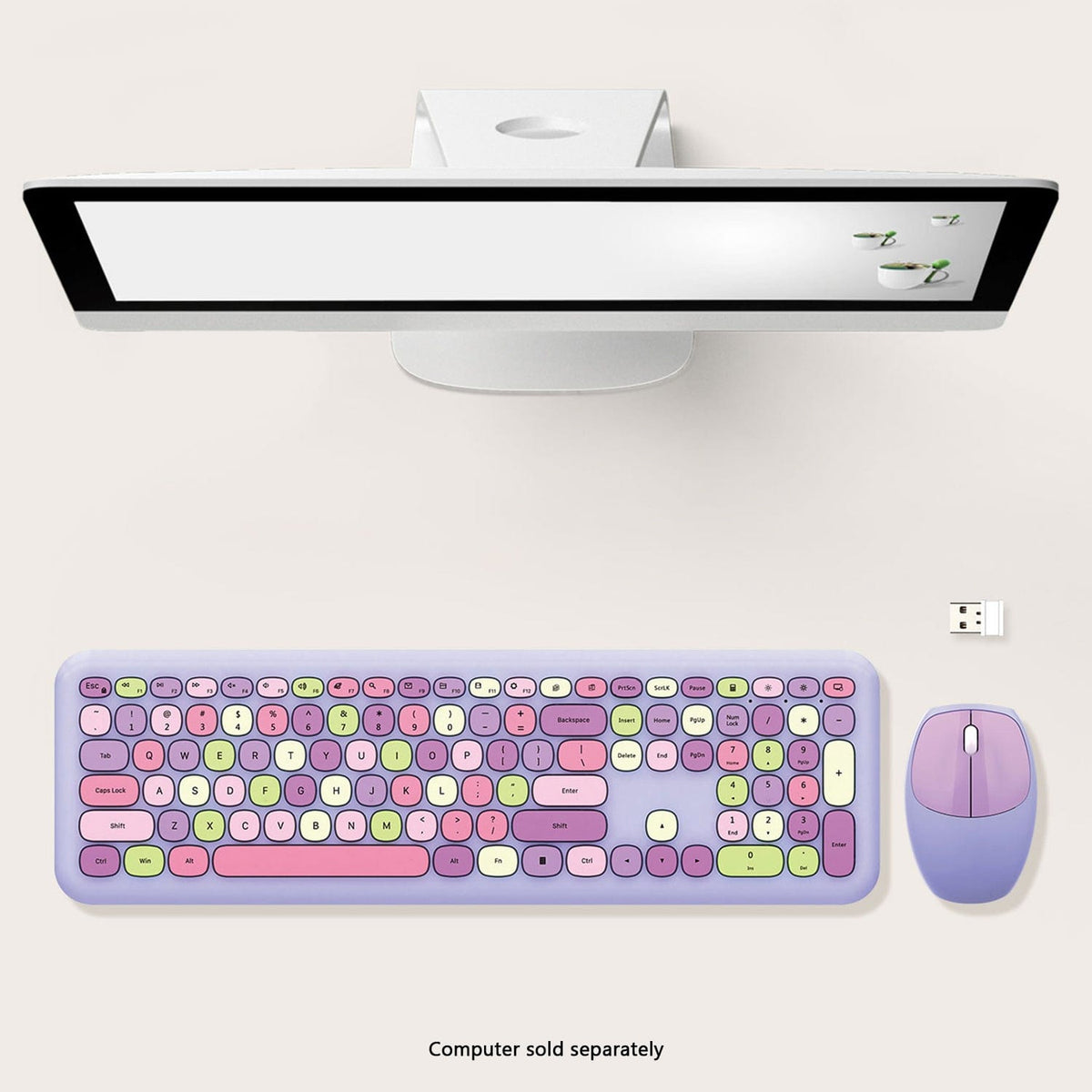 Purple KB5 keyboard and mouse beneath a desktop monitor sold separately