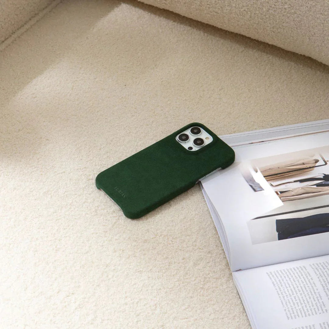 Luriax Minimal iPhone 15 Case — British Racing Green — shown in use