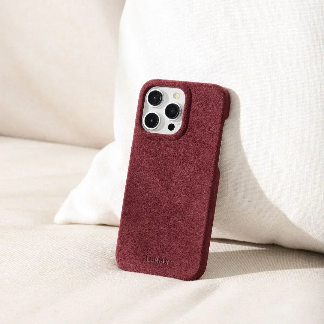 Luriax Minimal iPhone 15 Case — Bordeaux — shown in use