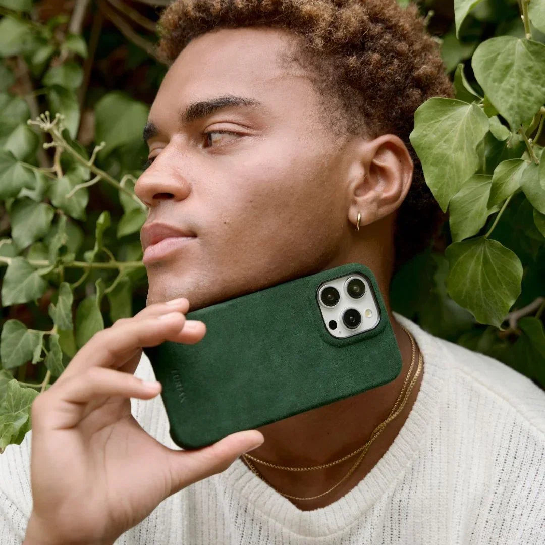 Luriax Signature Handcrafted Case iPhone 15 — British Racing Green — shown in use