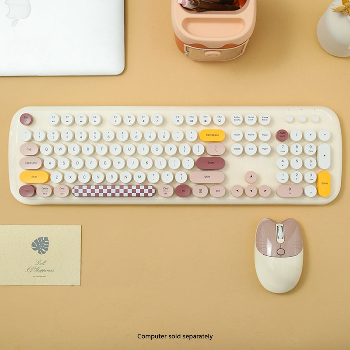 Beige KB8 keyboard and mouse on a yellow desk