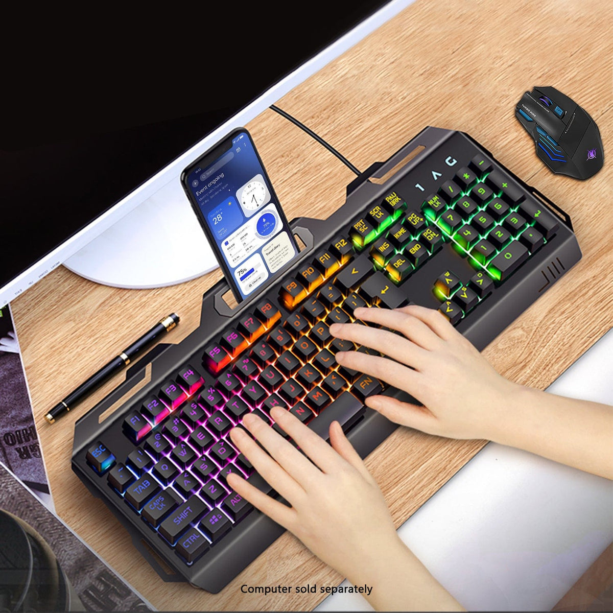 Typing on the KB37 keyboard with a phone in the holder