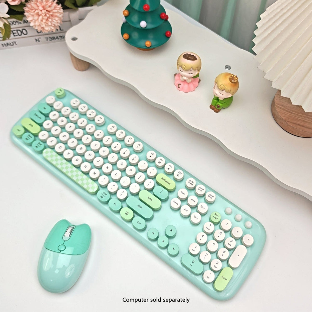 Green KB9 keyboard and mouse in a desk setting