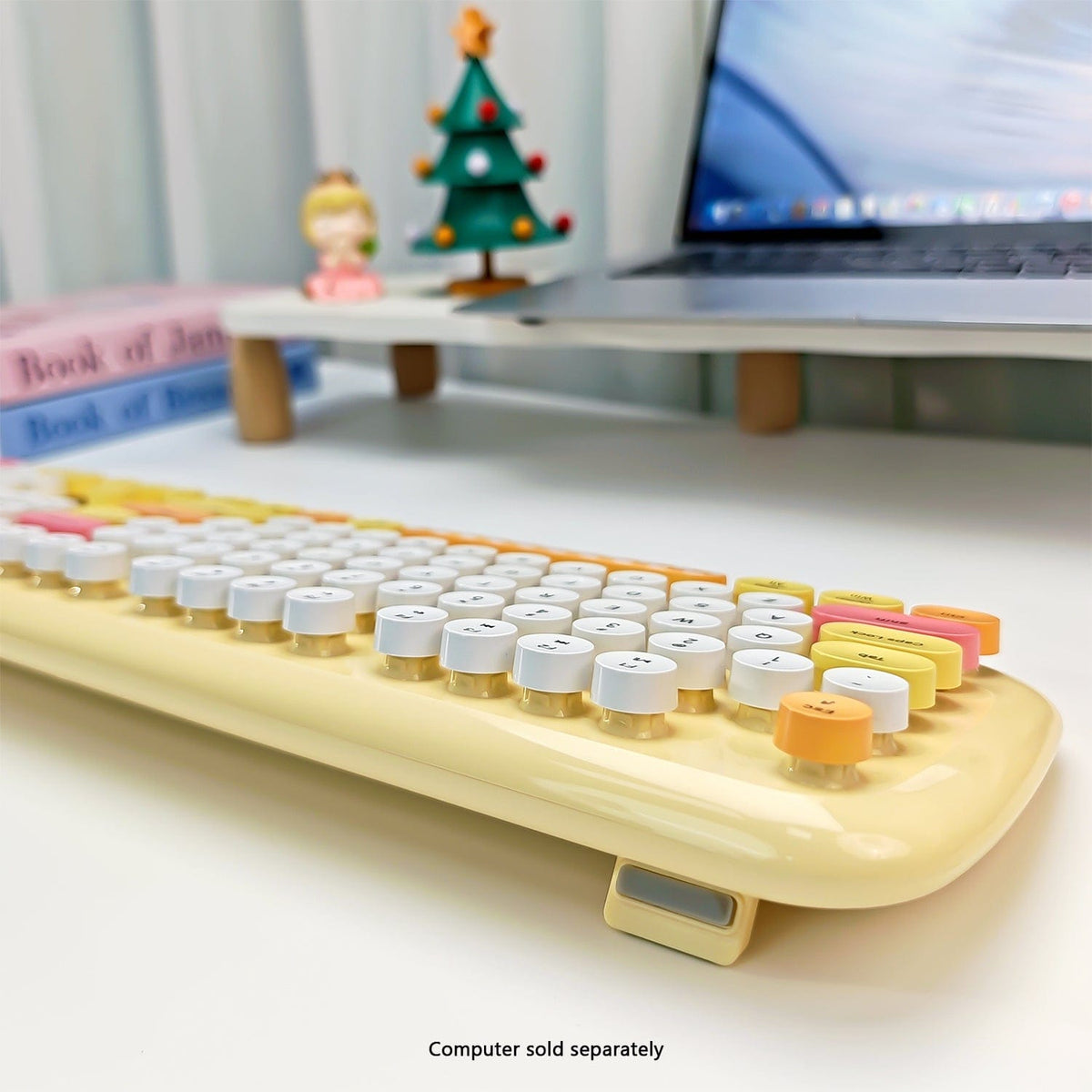 Yellow KB13 keyboard side profile with folding feet