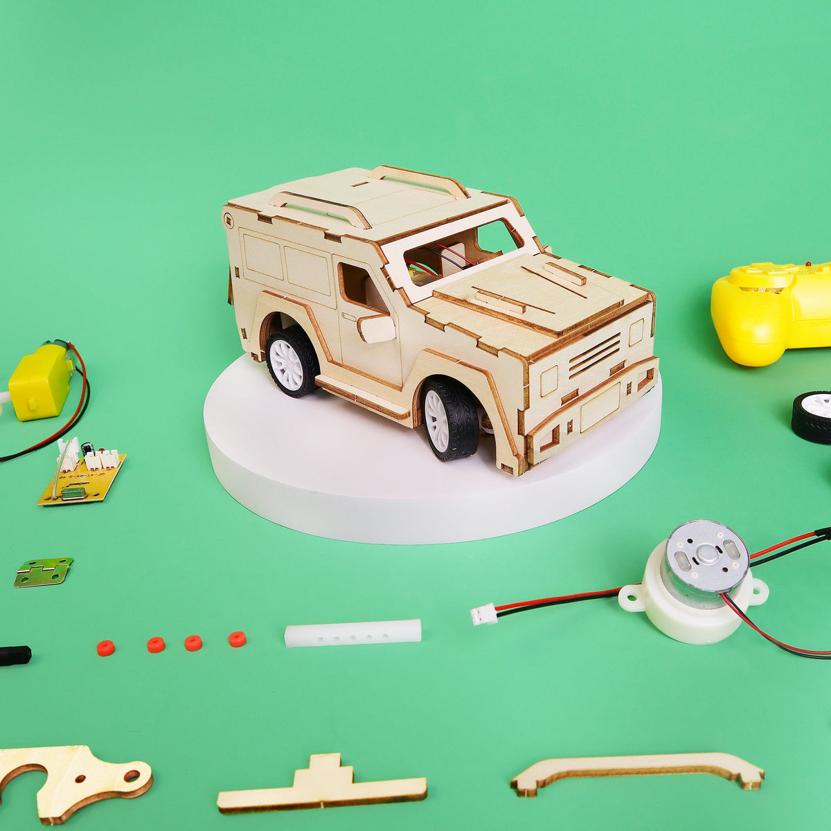 Kitsville 2.4 GHz RC SUV Building Kit — angled SUV and parts