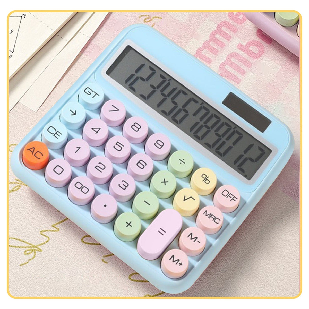 SaharaCase Blue KB50 calculator pictured on a desk with stationery