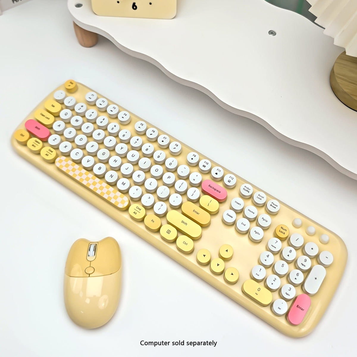 Angled view of the yellow KB13 keyboard and mouse