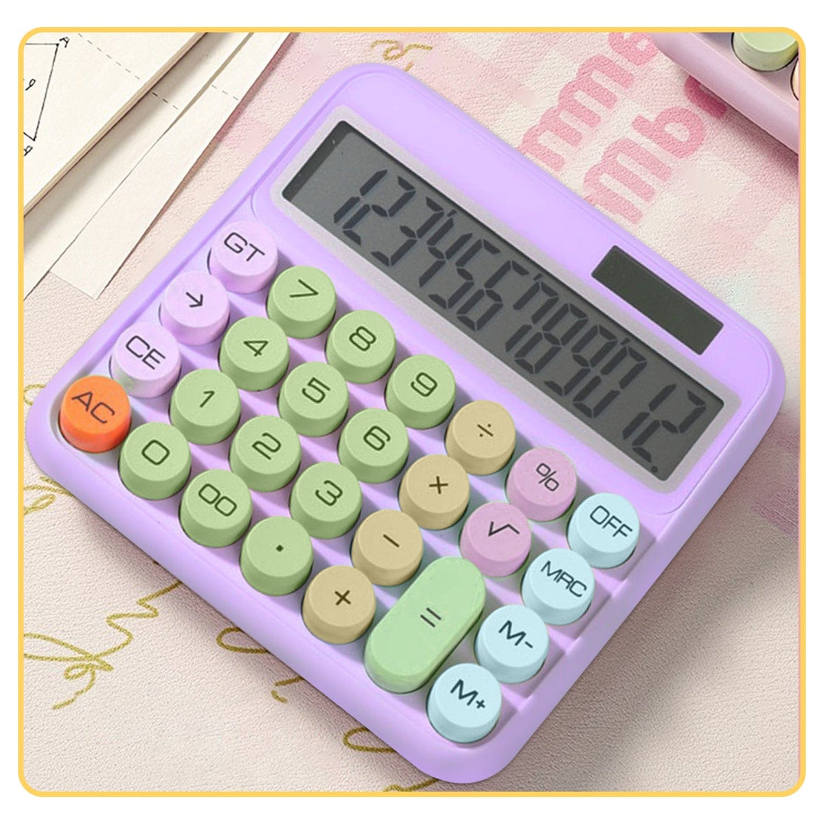 SaharaCase Purple KB51 calculator pictured on a desk with stationery