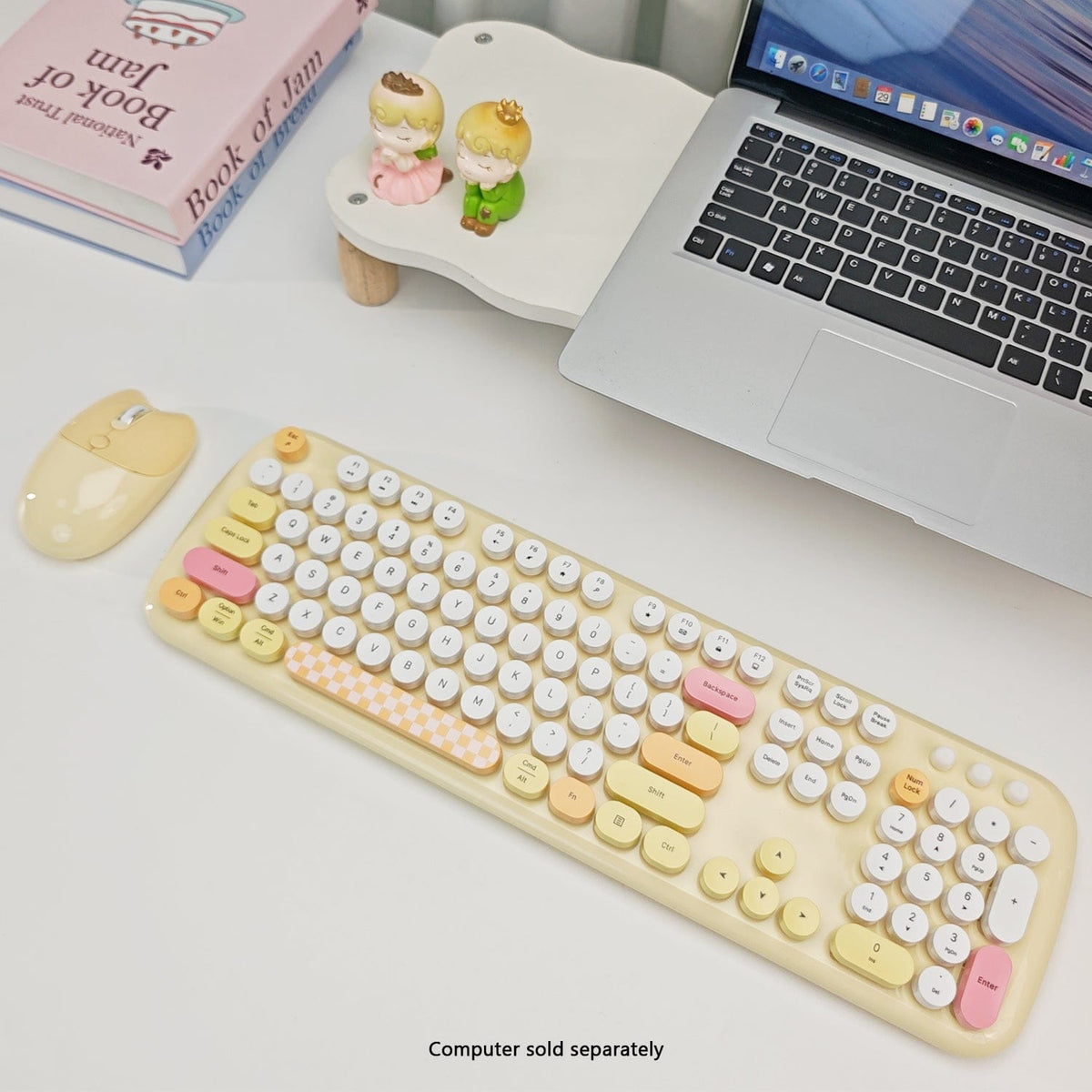 Yellow KB13 keyboard and mouse beside a laptop sold separately