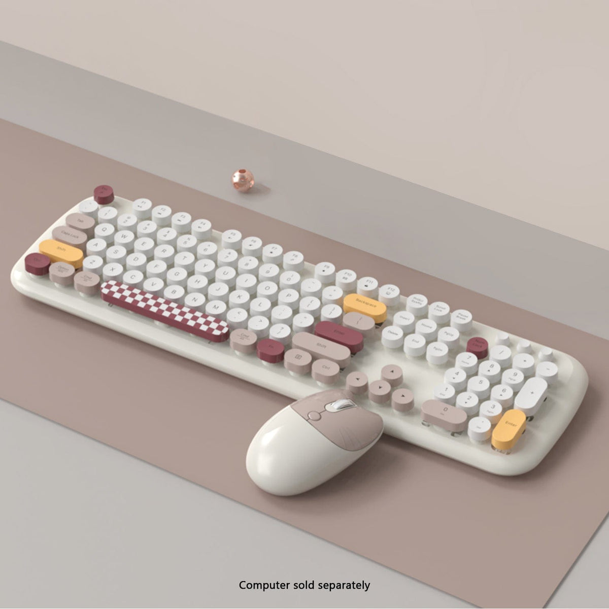 Beige KB8 keyboard and mouse on a desk
