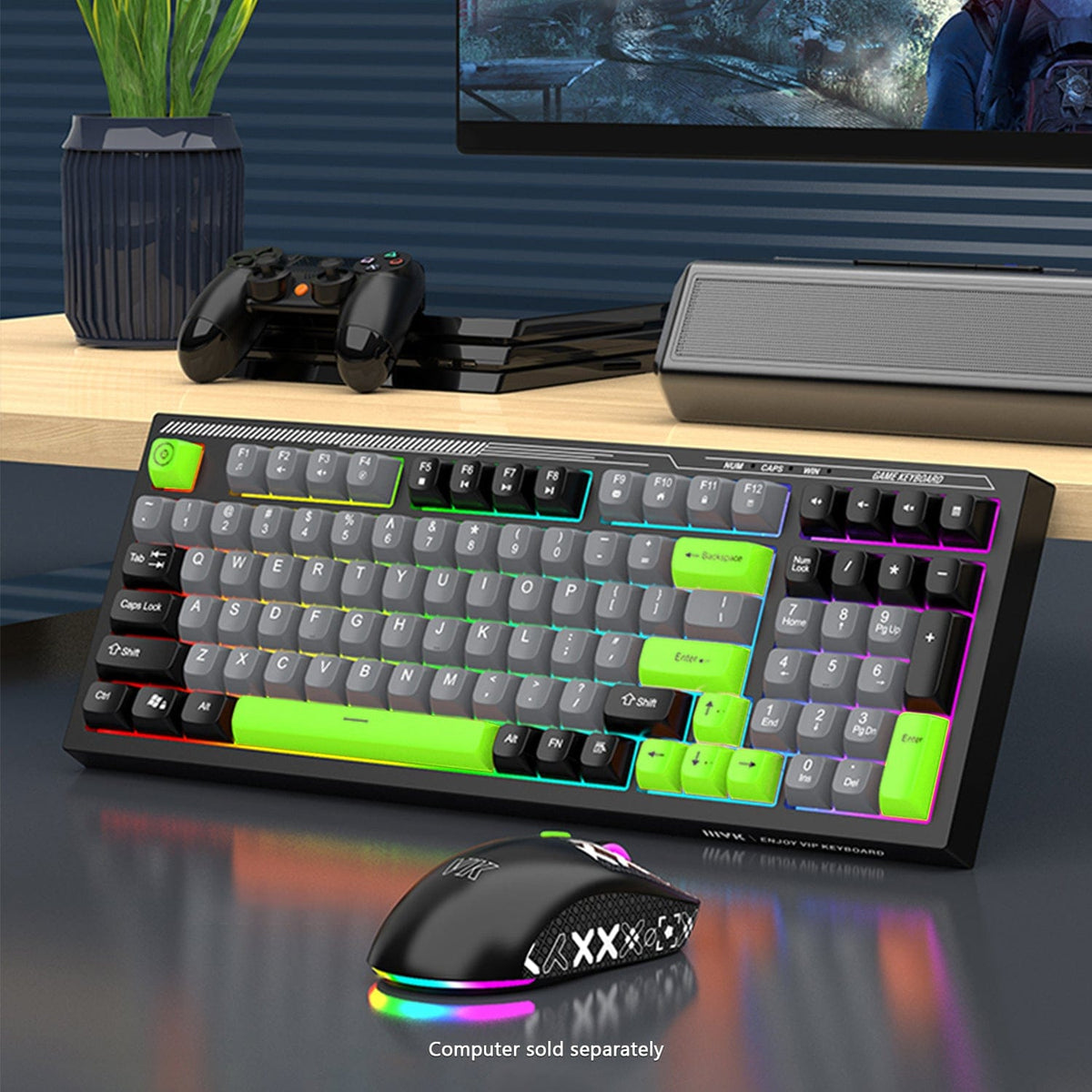 KB31 keyboard and mouse illuminated below a desktop monitor