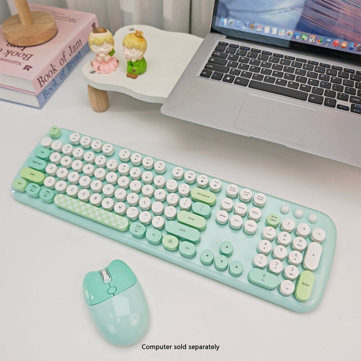 Green KB9 keyboard and mouse beside a laptop sold separately