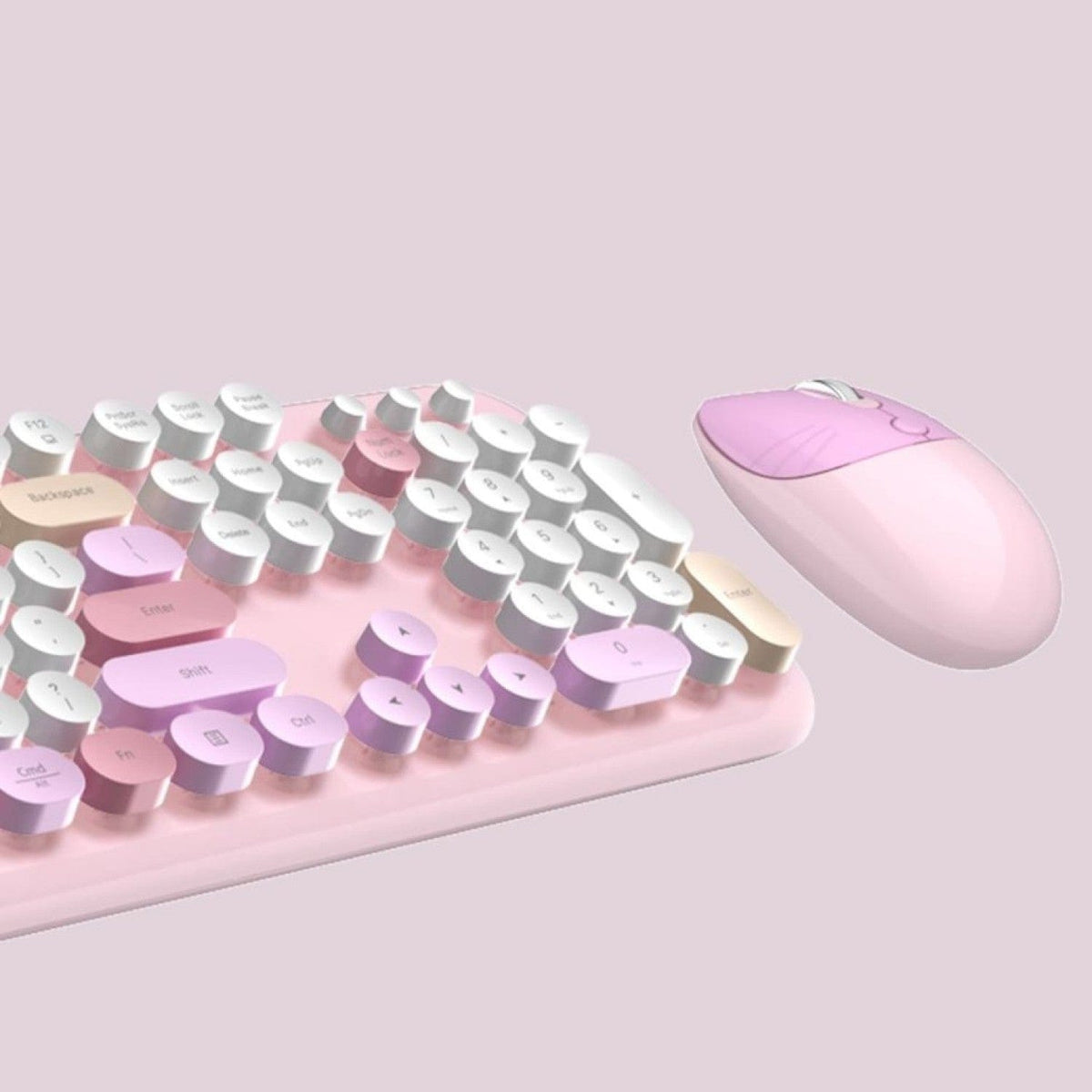 Close-up of pink KB10 rounded keys and mouse
