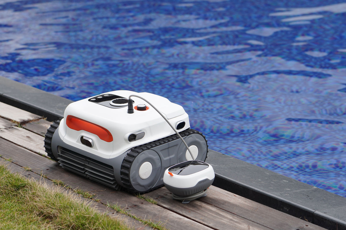 Sublue BN Pro robotic pool cleaner and floating module beside a pool