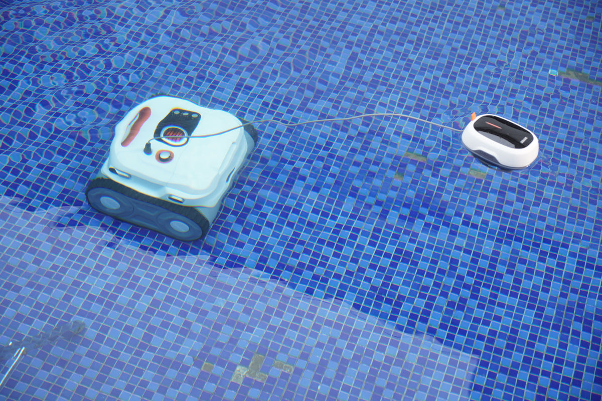 Sublue BN Pro robotic pool cleaner and floating module in a tiled pool