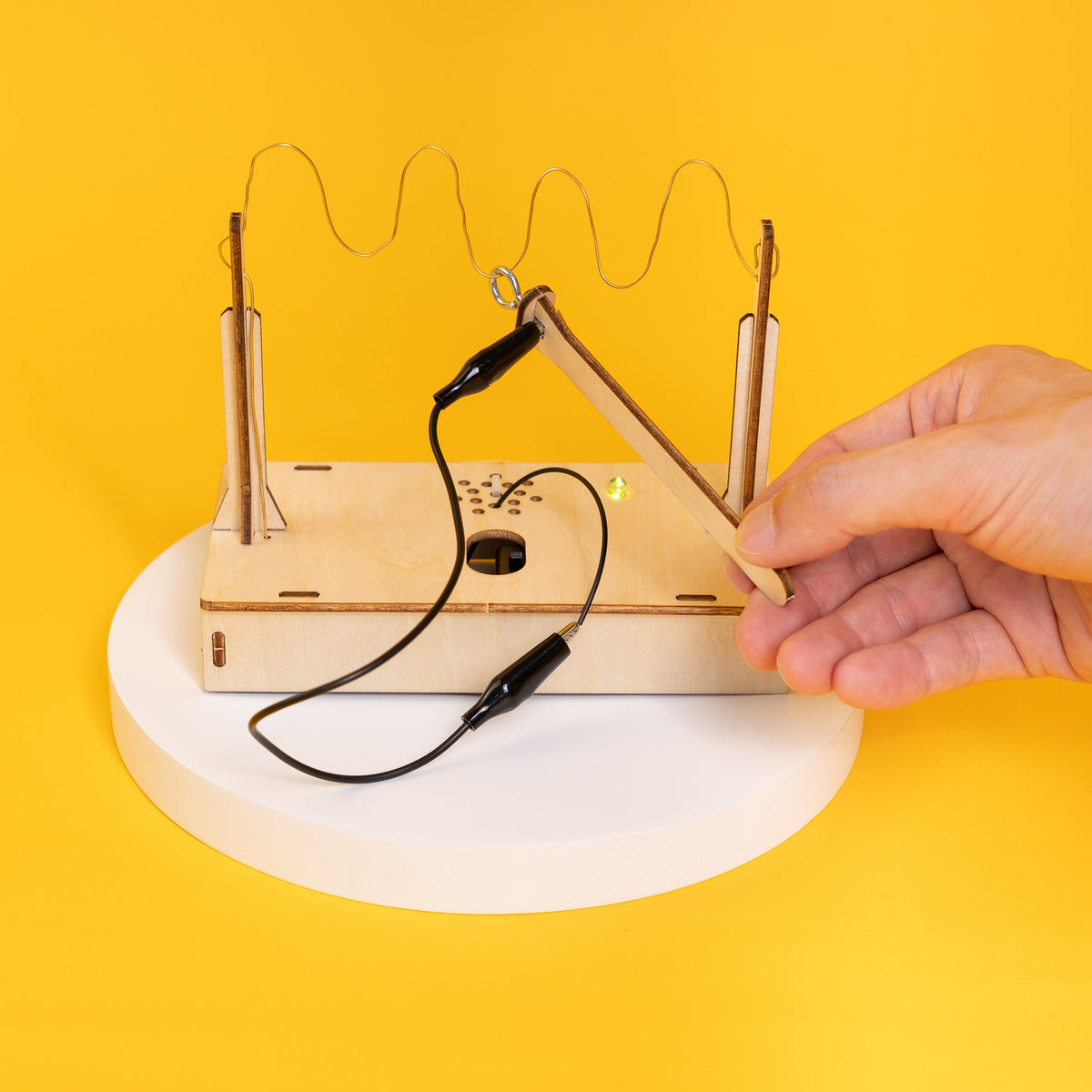 Kitsville Electronic Buzz Wire Game Kit — hand guiding wire loop