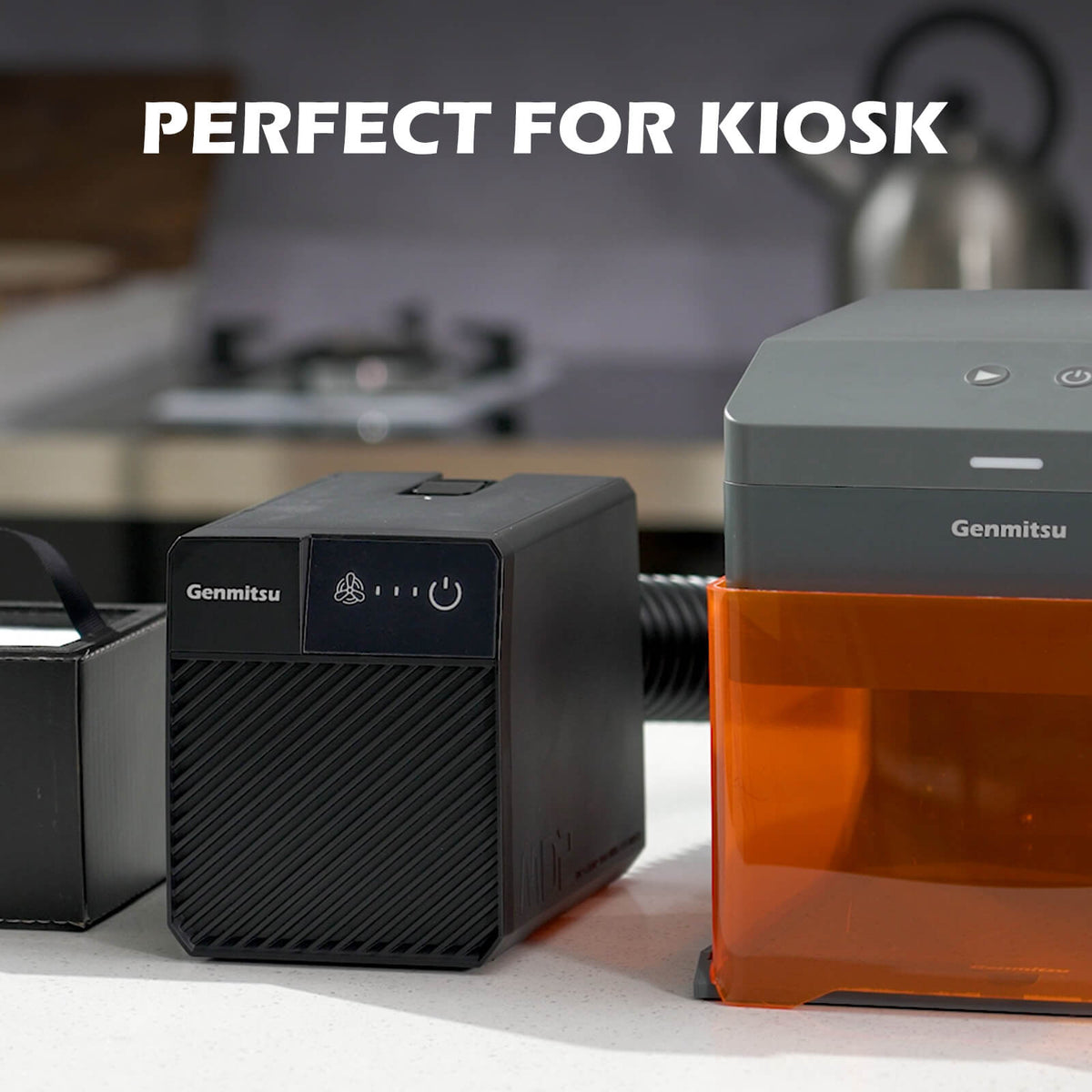 Genmitsu MD2 smoke purifier beside a Kiosk laser engraver