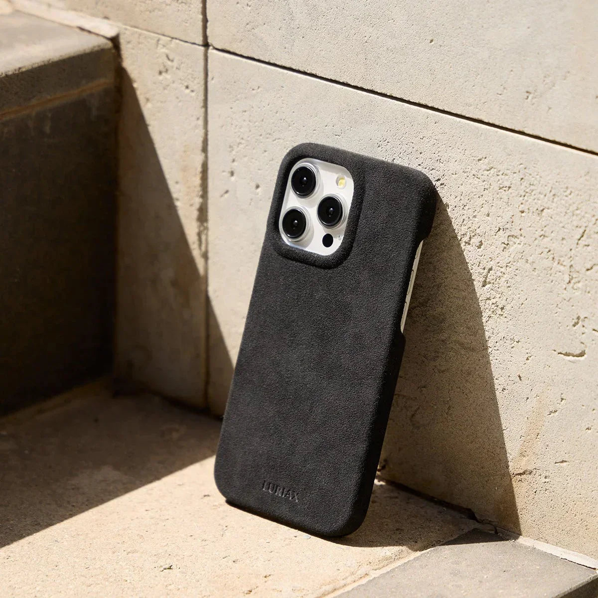 Luriax Minimal iPhone 15 Case — Black Caviar — shown in use