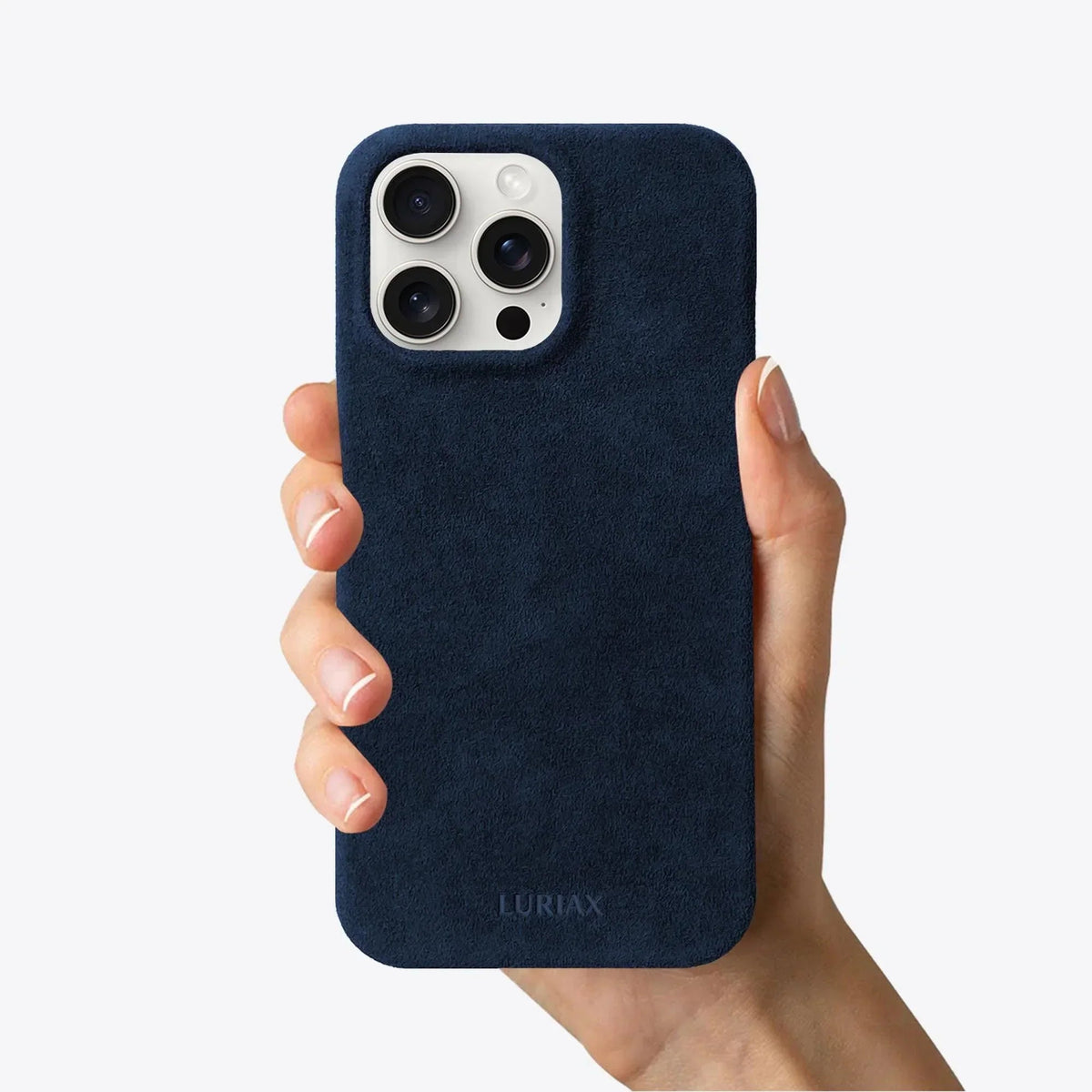 Luriax Minimal iPhone 15 Case — Midnight Blue — shown held in a hand