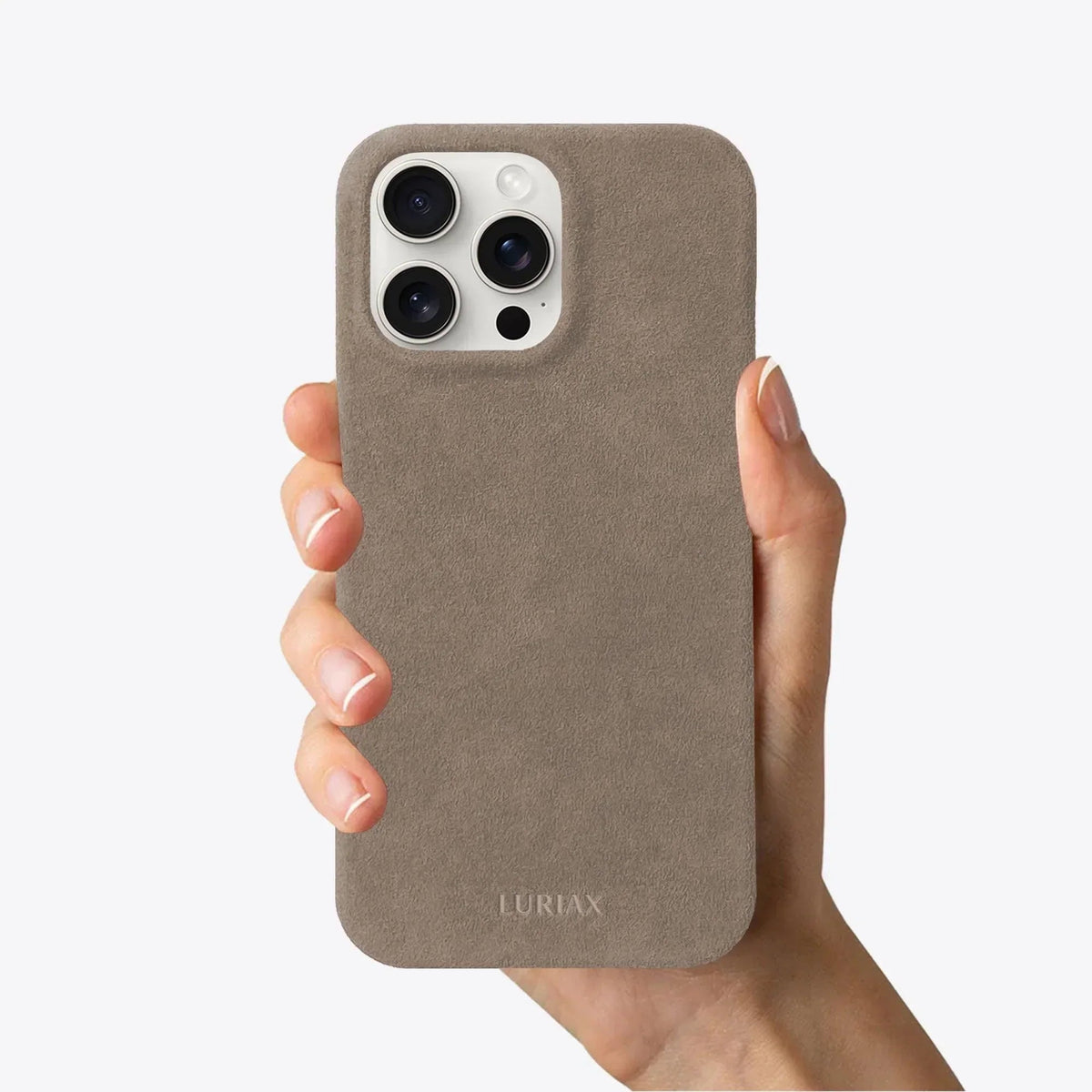 Luriax Minimal iPhone 15 Case — Malibu Beige — shown held in a hand