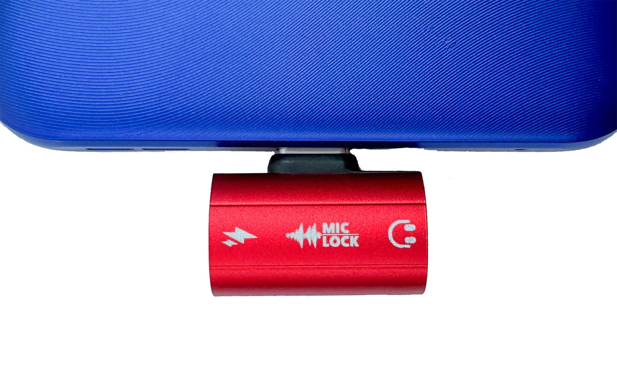 Mic-Lock Red HiFi adapter connected to a phone in a blue case