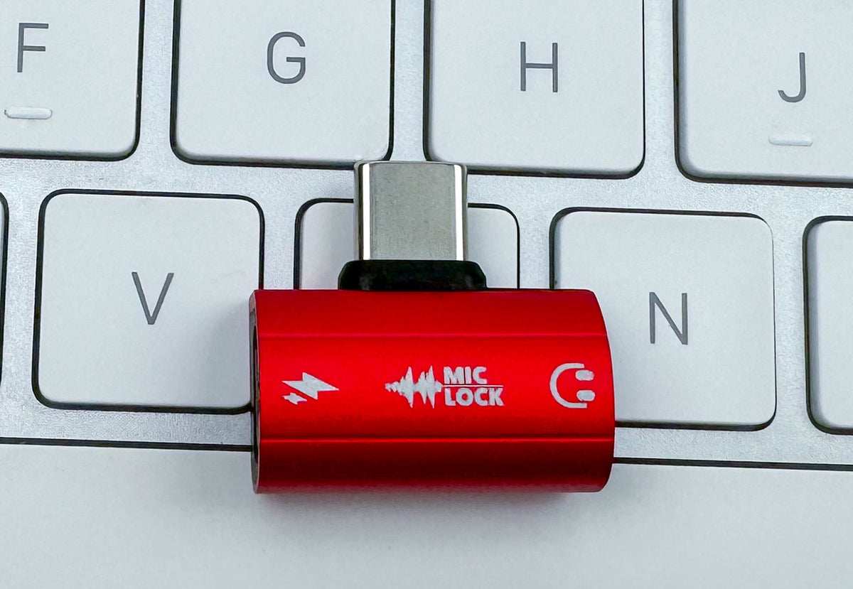 Mic-Lock Red HiFi adapter on a keyboard for scale