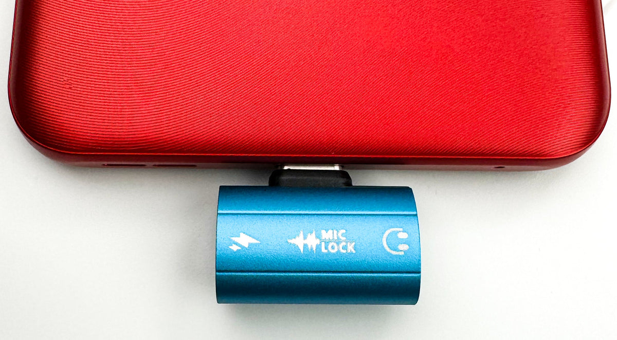 Mic-Lock Blue HiFi adapter connected to red phone case