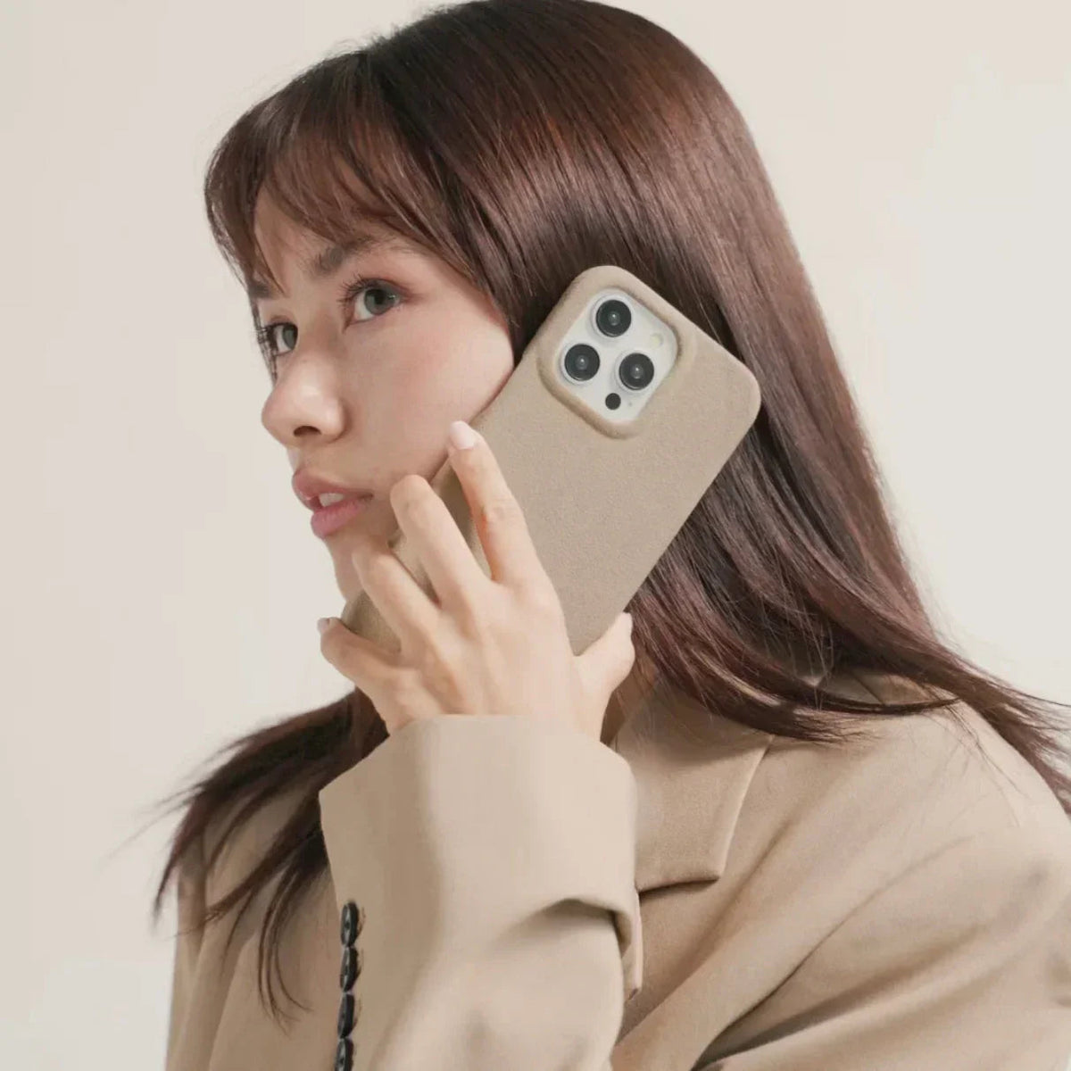Luriax Minimal iPhone 15 Case — Malibu Beige — shown in use
