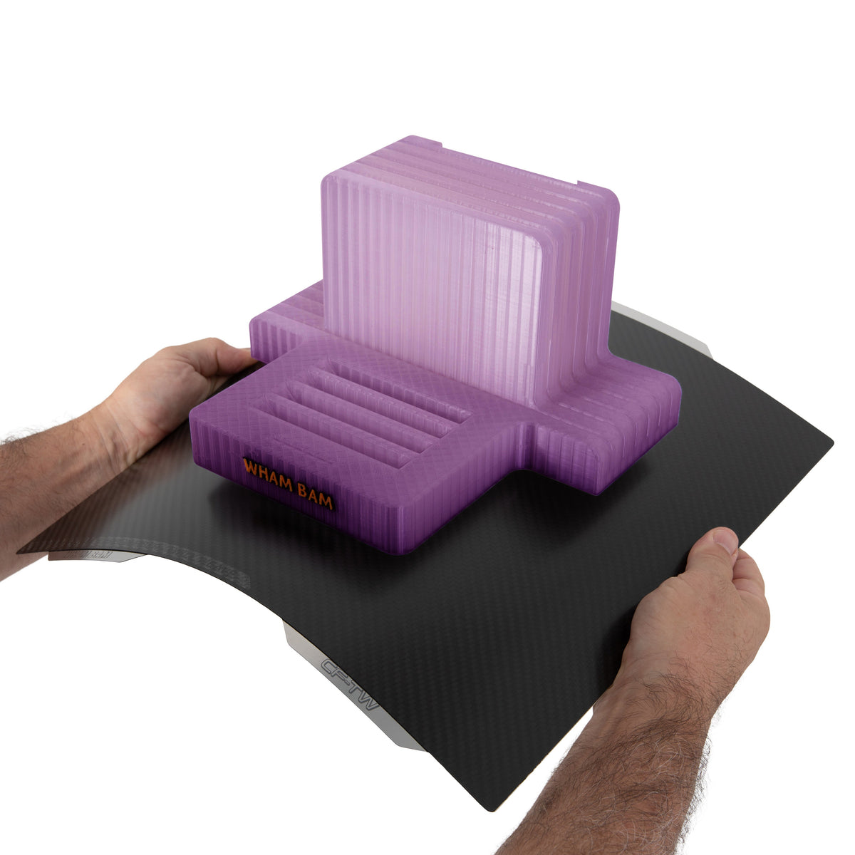 Flexing carbon-fiber plate to release an example purple print; print not included