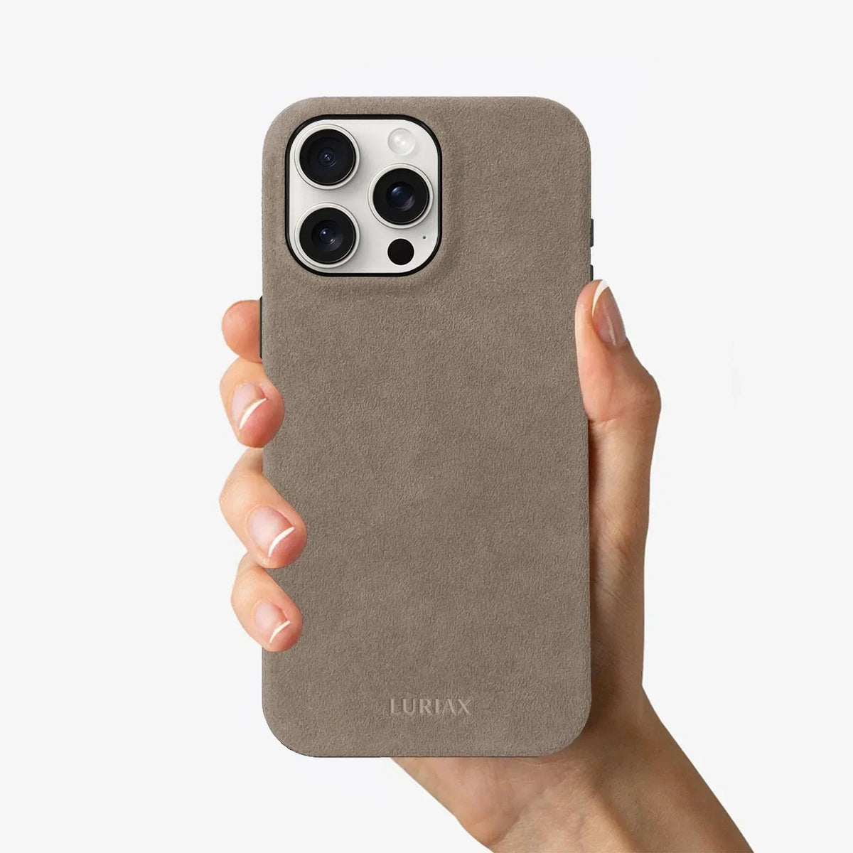 Luriax Signature Handcrafted Case iPhone 16 — Malibu Beige — shown held in a hand
