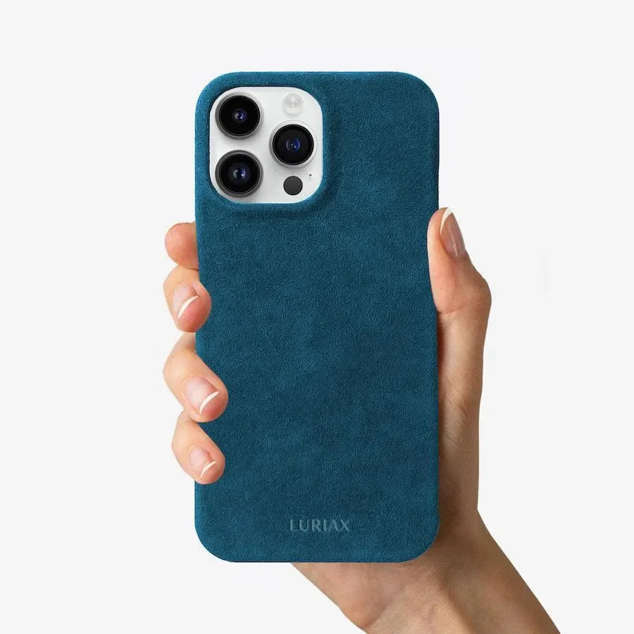 Luriax Minimal iPhone 14 Case — Prussian Blue — shown held in a hand