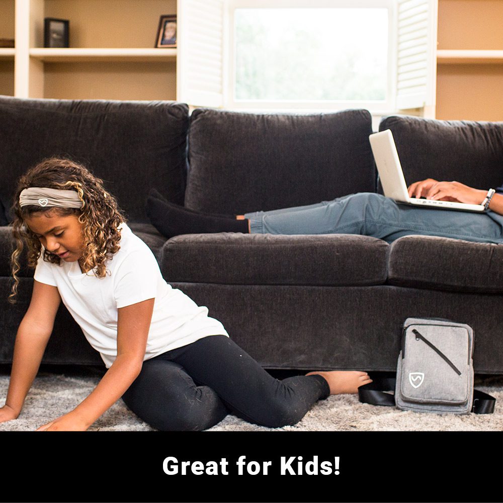 SYB Sling Bag beside a child sitting on floor