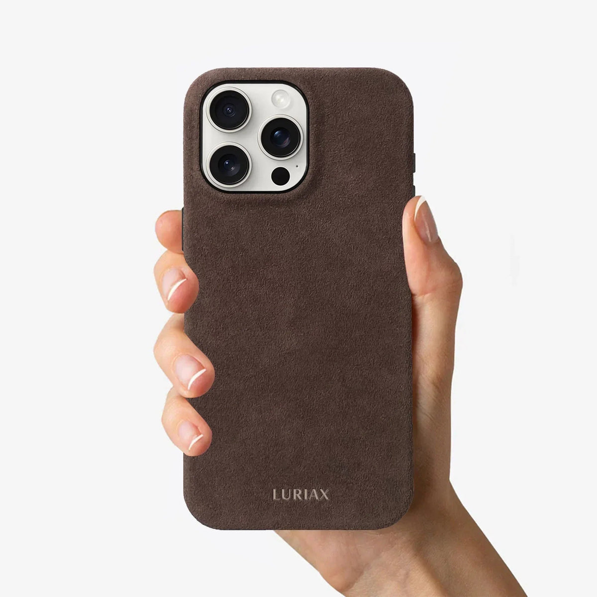 Luriax Signature Handcrafted Case iPhone 16 — Brown — shown held in a hand