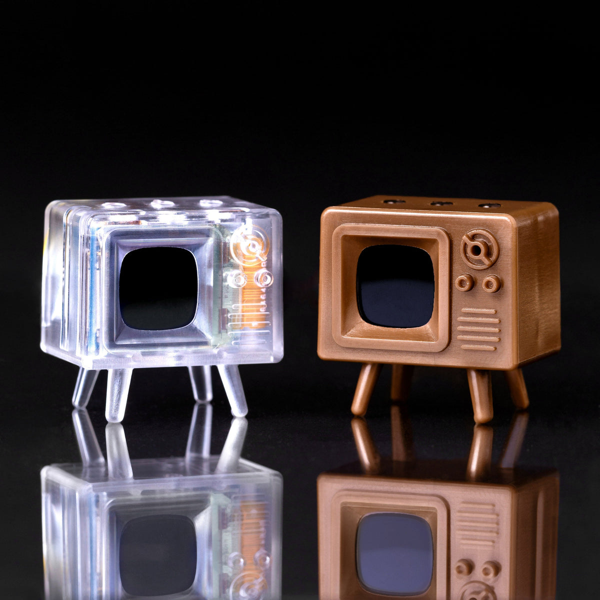 Clear and brown TinyTV Mini models side by side
