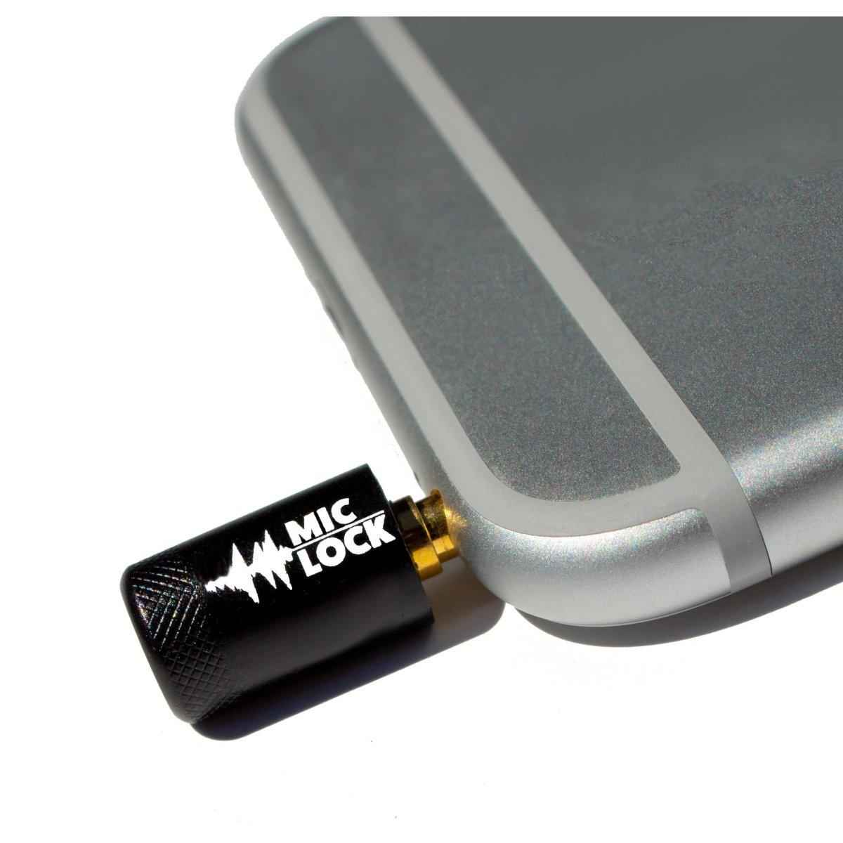 Mic-Lock Black microphone blocker connected to a phone