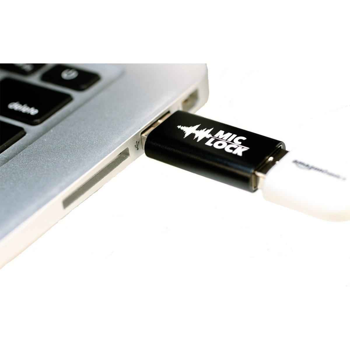 Mic-Lock Secure Charger connected to laptop and charging cable