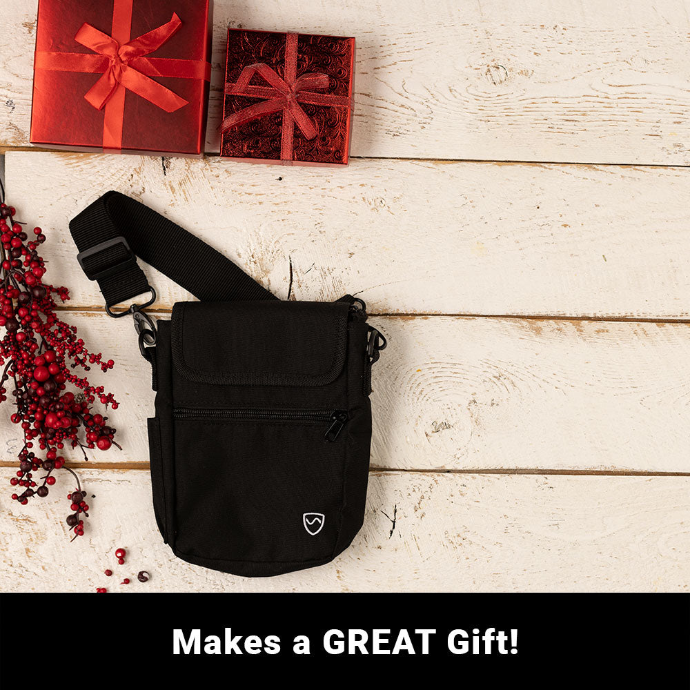SYB Phone Pouch Deluxe beside gift boxes